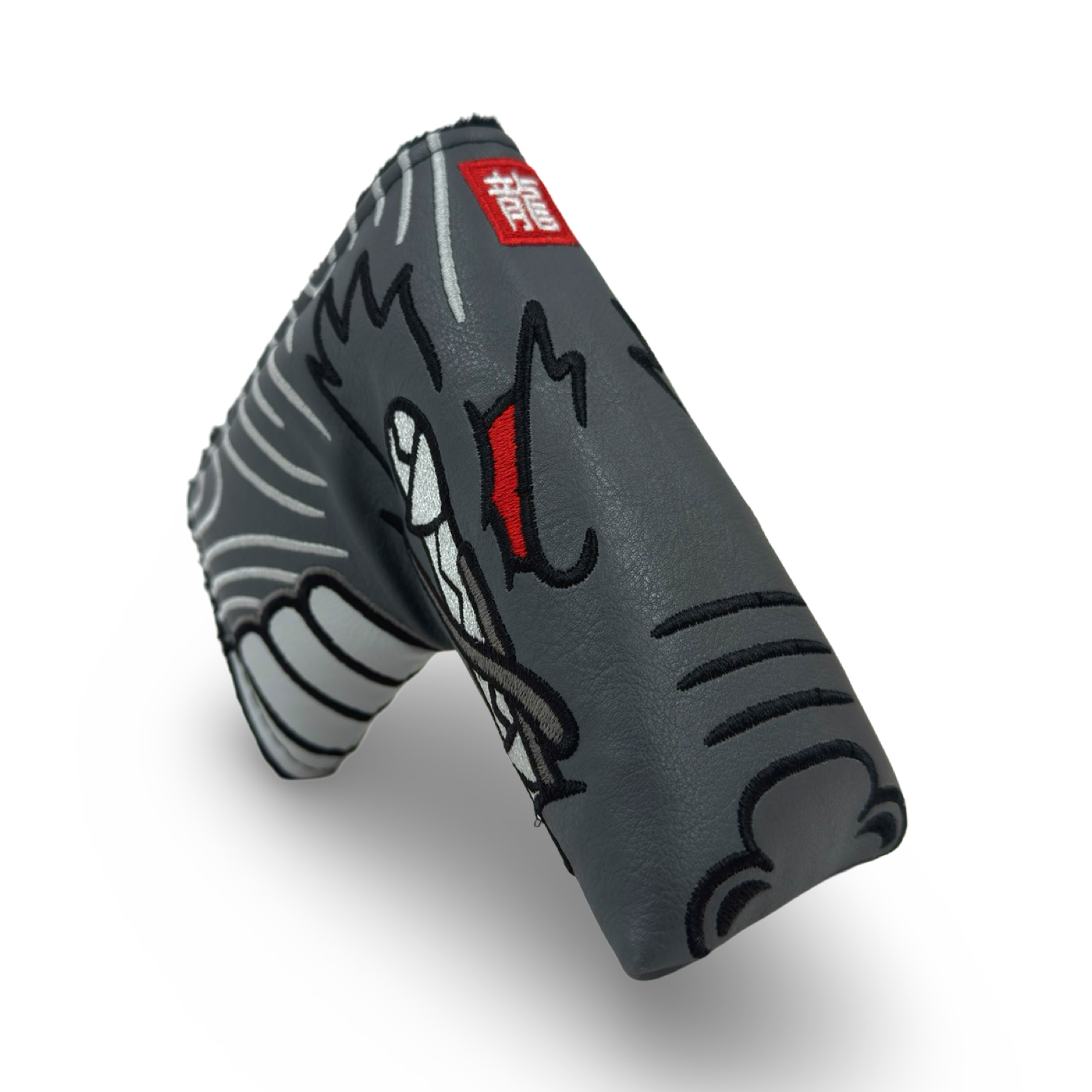 A golf putter headcover featuring a dragon head shape.