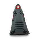 A golf putter headcover featuring a dragon head shape.
